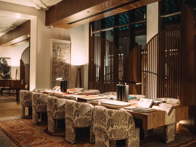 Hotel private dining room with a long table set for a group